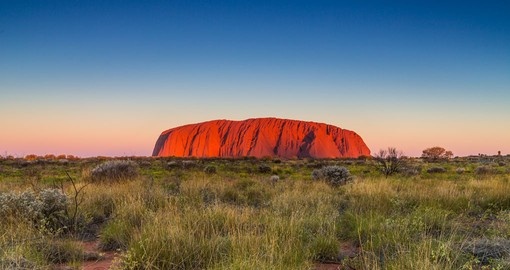Soar above Ayers Rock and its spectacular surroundings on your Australia Vacation