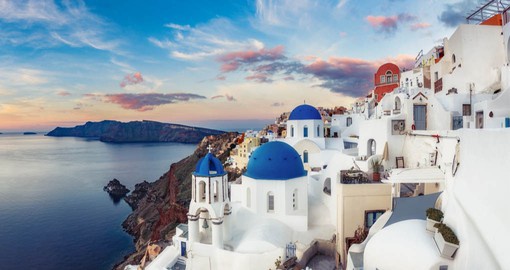 Volcanic sand beaches and dazzling panoramas make Santorini the model of the Greek Isles