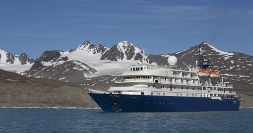 Embark on the Ocean Adventurer and travel throughout the Arctic on your Arctic Circle Travel