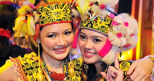 Performers wearing traditional costumes - a great photo opportunity while on one of our Malaysia tours.
