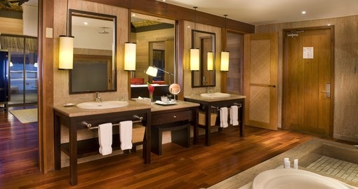 Pristine bathrooms and high quality furniture are a guarantee at the St. Regis Bora Bora during your Tahiti Vacations.