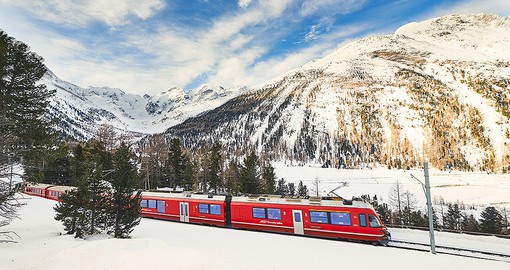 Bernina Express runs along the World Heritage Site known as the Rhaetian Railway