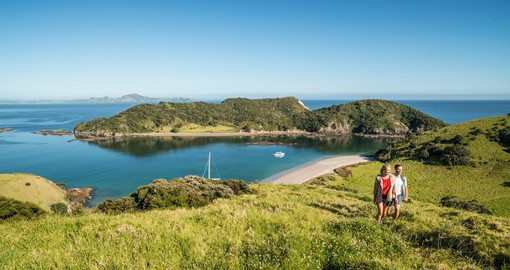 Trek up the hillside of Cape Reinga and enjoy the beautiful scenery on your New Zealand Vacation.