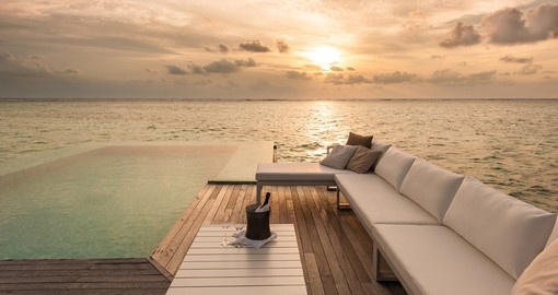 Experience the sunset while you sip on a bottle of champagne on your Trip to Maldives