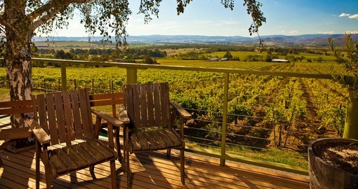 Enjoy beautiful view of Yarra Valley vineyard from a porch during your next Australia vacations.