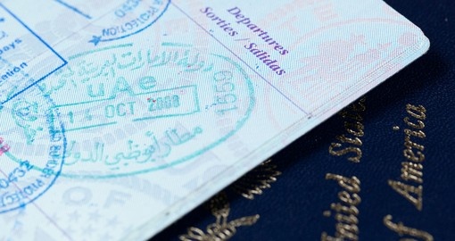 Visa and immigration stamps in US passport for Dubai or Abu Dhabi