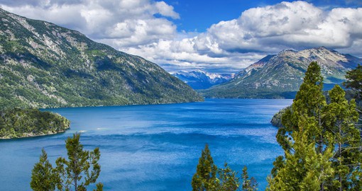 The crystal-clear blue waters of glacial Lake Nahuel Huapi  cover and area of 338 square kilometers
