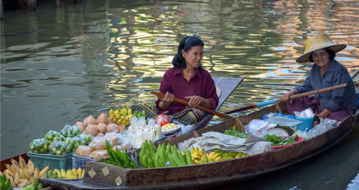Take a stroll throughout the Floating Market on your trip to Thailand