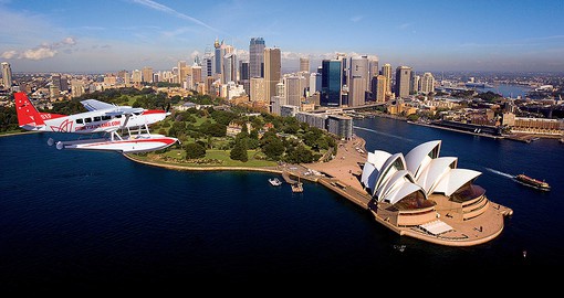 Experience Sydney opera house at dawn during your next Australia vacations.
