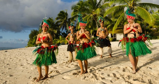 Take in a traditional dinner and show on your Cook Islands vacation