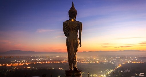 Golden Buddha statue in Khao Noi Temple