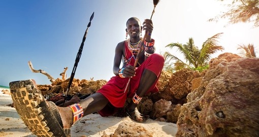 Meet Masai people on the beach during your next trip to Kenya.