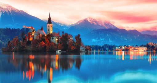 With a picture-perfect church on an islet and a medieval castle clinging to a rocky cliff, Lake Bled is Slovenia's most popular resort