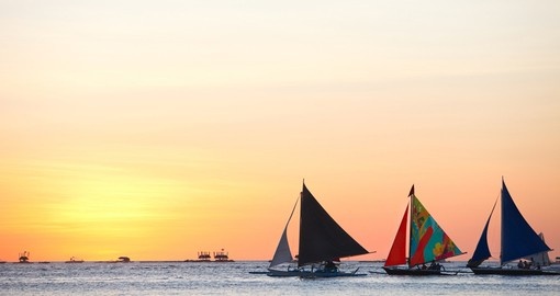 Sailboats against beautiful sunset