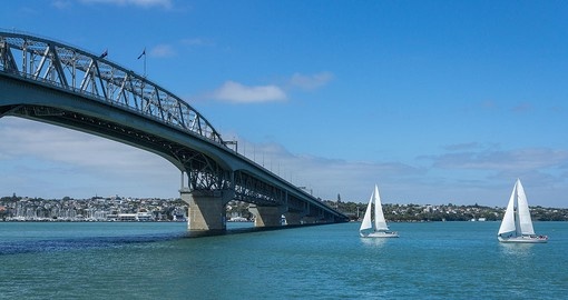 Pass under Harbour Bridge, a major boating area in the region on your New Zealand Vacation