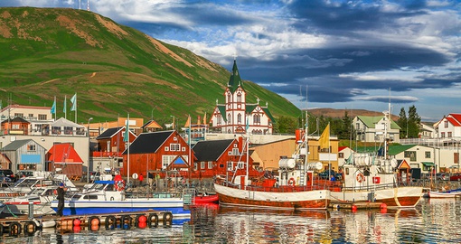 Enjoy the picturesque and colorful houses of Husavik on your Trip to Iceland