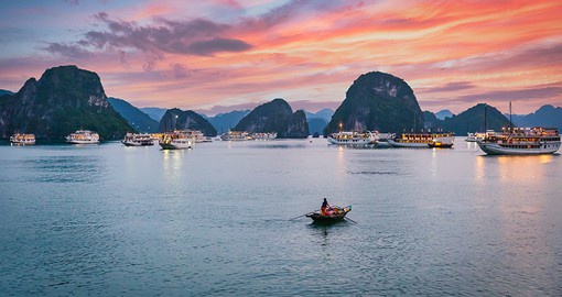 A UNESCO World Heritage Site, Halong Bay is known for its emerald waters and towering limestone islands