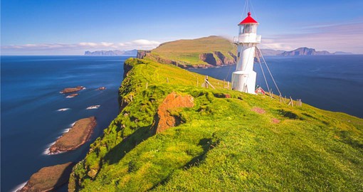 The iconic Lighthouse on Mykines Island is a part of your Faroe Islands trip