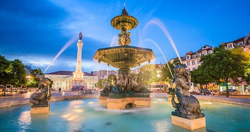 Explore Lisbon's daily life at Rossio Sqaure, a site known for markets, fairs, parades, and rallies