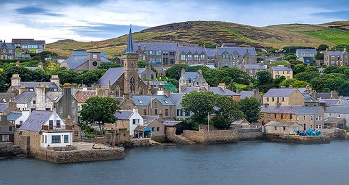 Enjoy the safe haven of Stromness, an isle shaped by the sea and used for safety by the Vikings