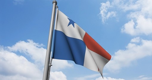Panama, flag is waving in front of blue sky and puffy clouds