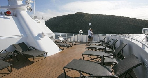Relax on the sun deck on your Galapagos Tour
