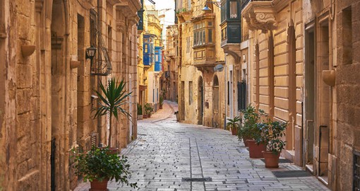 Enjoy an evening stroll through the plazas and cobbled streets of Valletta