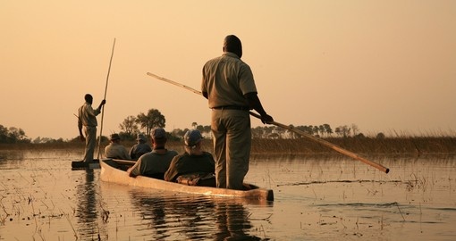 Sailing in traditional mokoro in The Okavango Delta