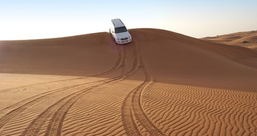 Dune riding in Arabian desert