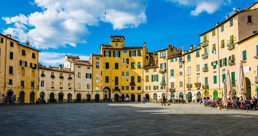 Explore the open plaza of Piazza Anfiteatro in the walled city of Lucca
