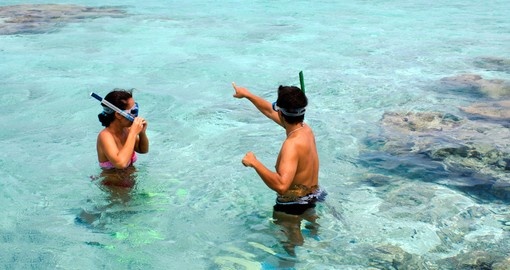 Couple snorkeling in Aitutaki Lagoon