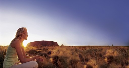 Include a memorable sunset at Uluru on your Australia Outback Vacation.