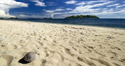 Walk on the white sandy beaches in Mamanuca Islands on your next Fiji vacations.