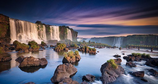 Count the cascades at Iguassu Falls, composed of 275 separate falls to create the largest broken waterfall
