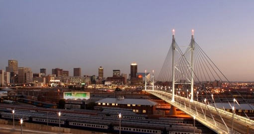Explore the Downtown Johannesburg skyline with the Mandela Bridge during your next trip to South Africa.