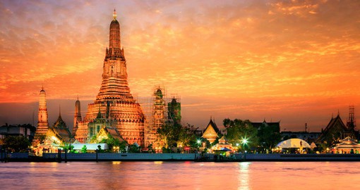 Cruise past Wat Arun at Sunset during your Thailand Vacation