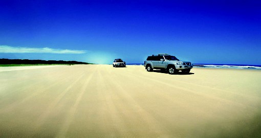 Drive along the sandy beaches littered across the Sunshine Coast during your Trips to Australia.