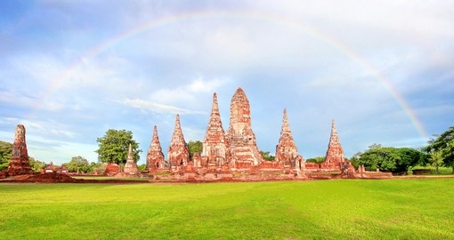 Wat Chaiwatthanaram old temple with beautiful rainbow