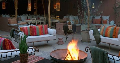 Sit around the fire and spend time with your friends/family after a Chile Tour