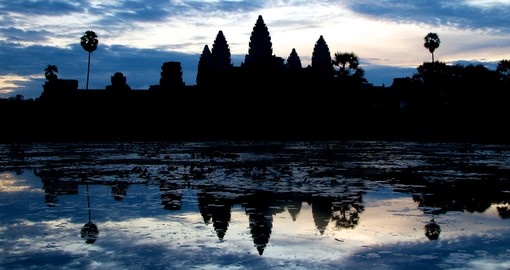 Take in a magical sunrise at Angkor Wat on your trip to Cambodia
