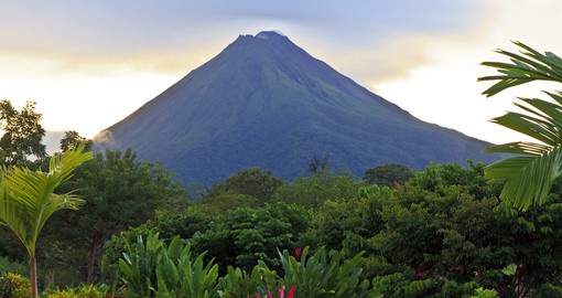Experience tranquility at La Fortuna, Costa Rica while viewing the breathtaking Arenal volcano in the background
