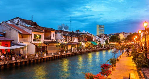 Embrace the local way of life by walking down the Malacca River on your Malaysian Vacation
