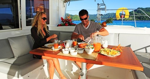 Enjoy traditional breakfast on board during your catamaran ride during your next trip to Bora Bora.