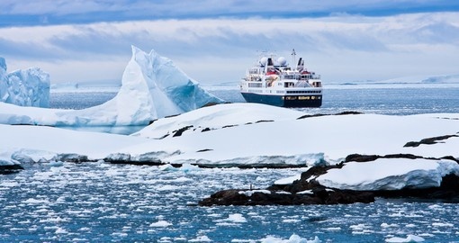 Big cruise ship in the waters of Antarctic