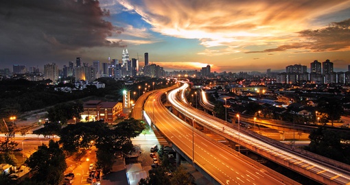 Enjoy the skyline of Kuala Lumpur that lights up during the night time on your Malaysia Vacation