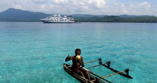 Experience traditional boat ride on your next trip to Papua New Guinea.