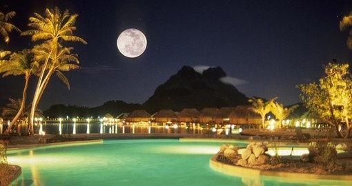 Enjoy swimming at night in the pool with gorgeous moonlight during your next Bora Bora vacations.