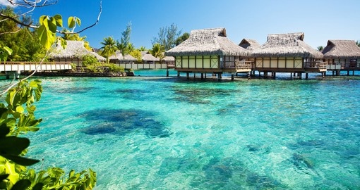 Overwater bungalows with an amazing green lagoon