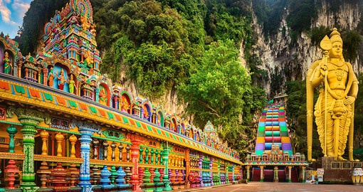 Walk the colourful steps to the Batu caves, a popular pilgrimage stop
