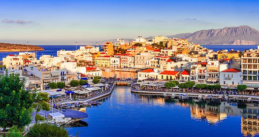 Enjoy a slower pace on the colourful coastal town of Agios Nikolaos,